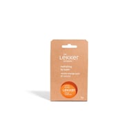 The Lekker Company Natuurlijke Lippenbalsem Orange Vanilla Swirl verpakking van voren