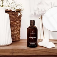 Junglück Reinigingsolie (100 ml) op bureau