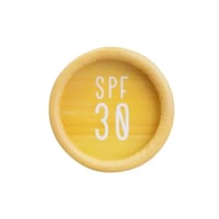 We Love The Planet Natuurlijke zonnebrandstick SPF 30 bovenkant